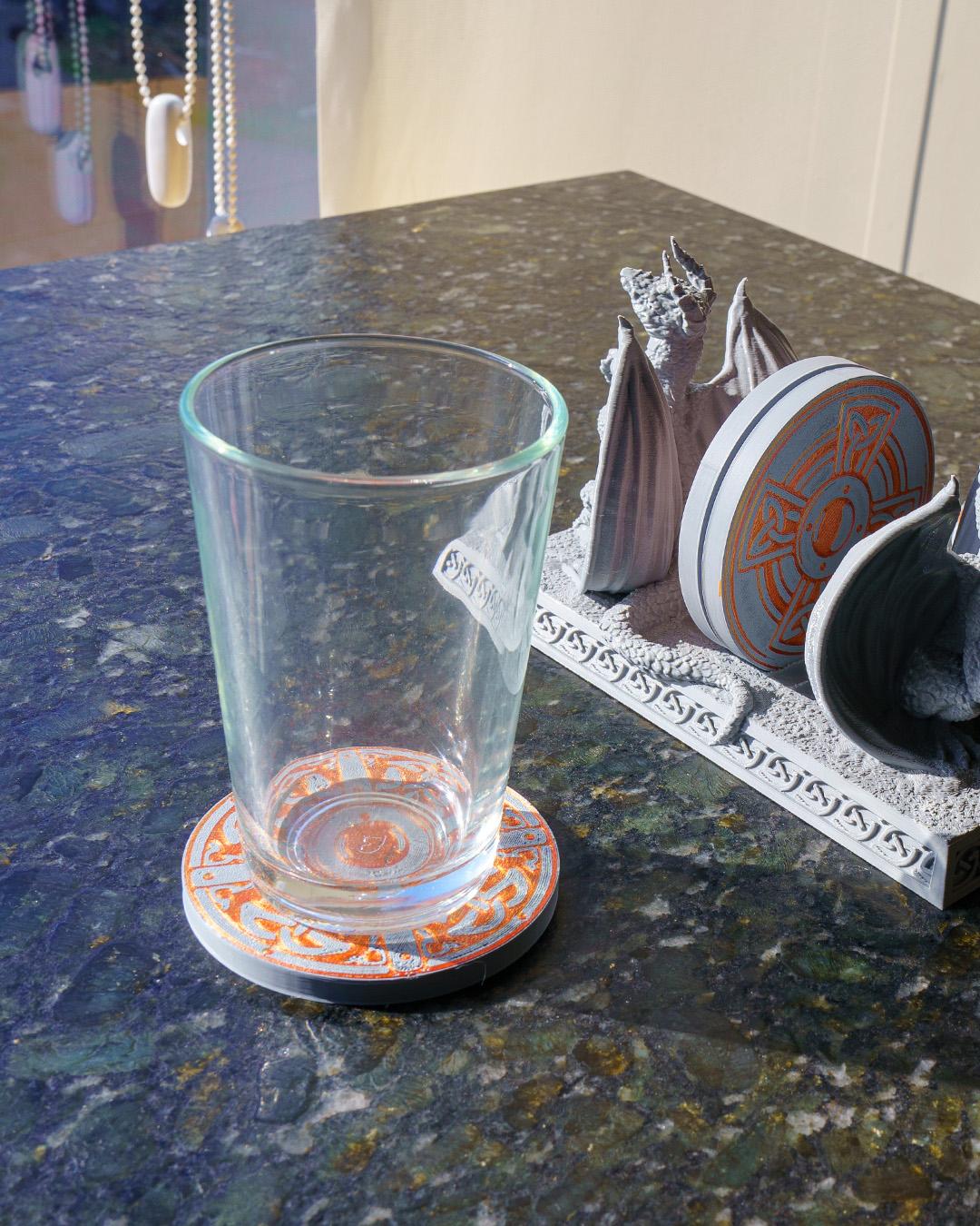 Dragon Drink Coasters complete with 2 dragons designed to hold them. Fun coasters for dungeon and dragons fans.