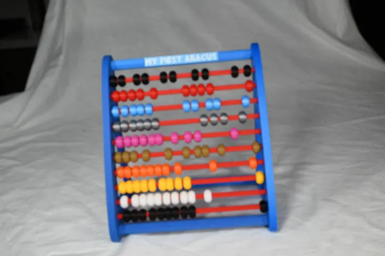 My first abacus. Toddlers toy to play with beads, lots of colours and tactile feeling, perfect for counting and learning