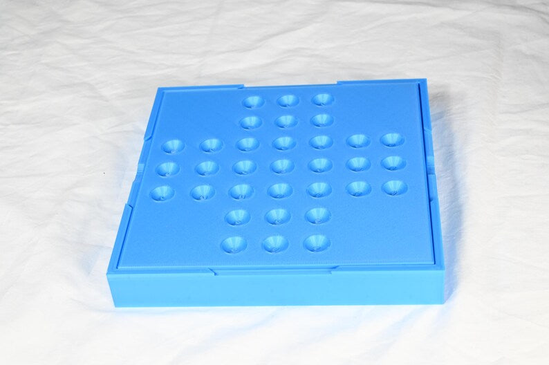 Solitaire game, marble game for one person. Board game for one complete in its own storage box