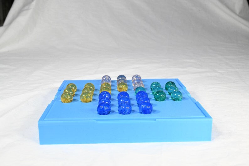 Solitaire game, marble game for one person. Board game for one complete in its own storage box