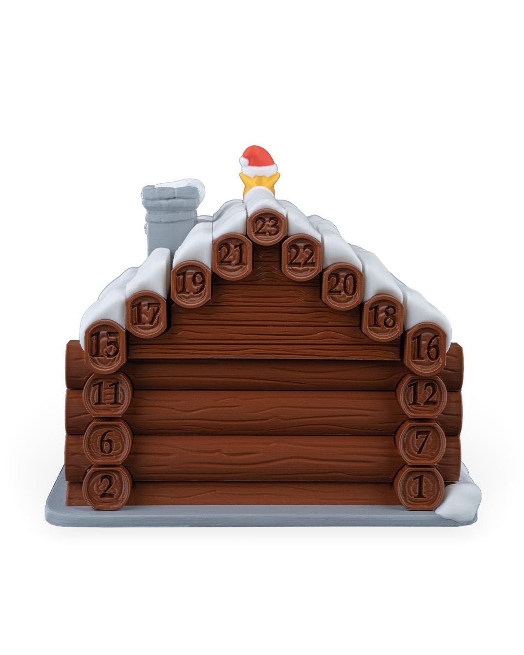 Santa's cabin advent calendar. Count down the days by building Santa's house. North Pole cabin