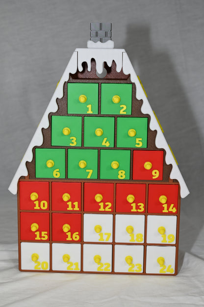 House shaped Christmas advent calendar with individually numbered drawers to countdown to Christmas day