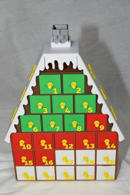 House shaped Christmas advent calendar with individually numbered drawers to countdown to Christmas day