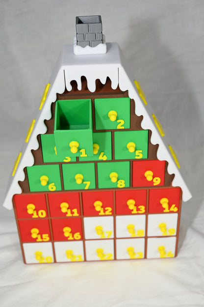 House shaped Christmas advent calendar with individually numbered drawers to countdown to Christmas day