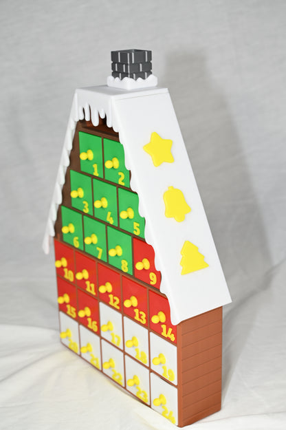 House shaped Christmas advent calendar with individually numbered drawers to countdown to Christmas day