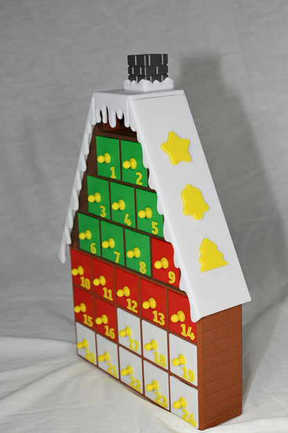 House shaped Christmas advent calendar with individually numbered drawers to countdown to Christmas day